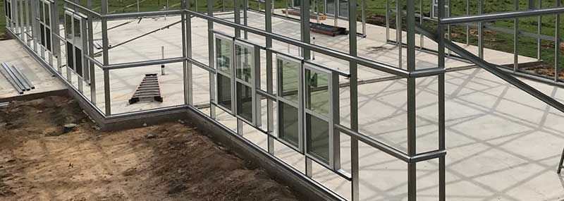 Windows installed on a steel barndominium frame